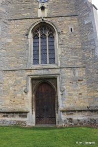 Great Barford - All Saints. West window and door.