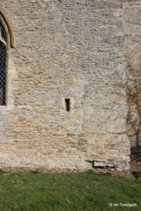 Harrold - St Peter. South aisle, site of old doorway.