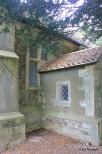 Hulcote - St Nicholas. Nave, south-west window and porch.