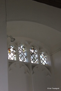 Langford, St Andrew. Chancel north window internal.