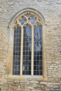 Riseley - All Saints. South aisle, west window.
