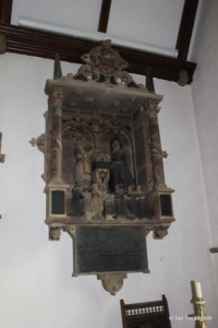 Biddenham, St James. Carving.
