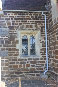 Stondon - All Saints. Nave, south-west window.