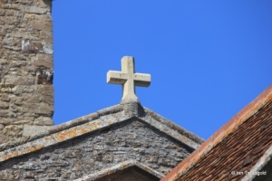Carlton - St Mary the Virgin. Nave gable cross.