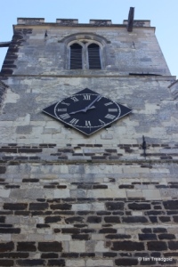 Sutton - All Saints. Tower, west face.