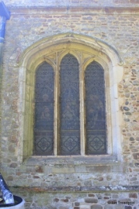 Sutton - All Saints. North aisle, north-west window.