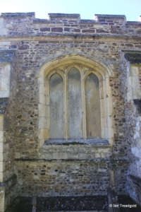 Sutton - All Saints. North aisle, blocked north-east window.