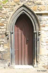 Bedford - St Peter de Merton. Priest's door external.