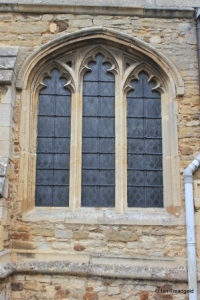 Cople - All Saints. South aisle, south-east window.