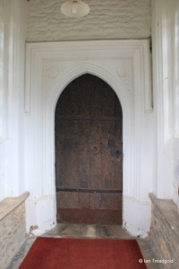 Cople - All Saints. South doorway.