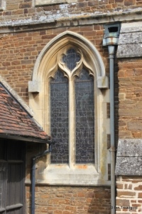 Campton - All Saints. South aisle, south-west window.
