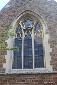 Campton - All Saints. Nave, west window.