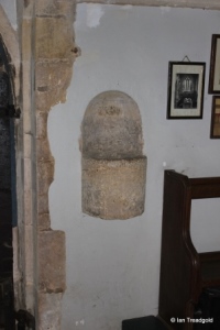 Turvey - All Saints. South door, holy water stoup.