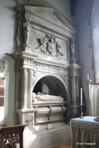 Turvey - All Saints. South aisle/chancel, tomb.