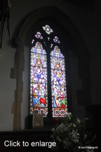 Turvey - All Saints. Chancel, north window internal.