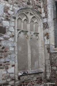 Cockayne Hatley - St John the Baptist. South aisle, blocked east window.