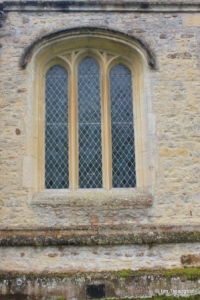 Willington - St Lawrence. North aisle, north-west window.