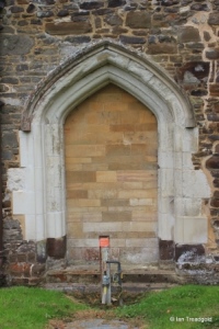 Eversholt - St John the Baptist. Blocked north doorway.