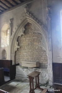 Yelden - St Mary. South aisle, tomb recess.