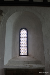 Everton - St Mary. Chancel, north round arch window internal.