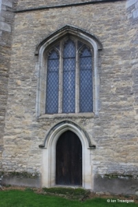 Goldington - St Mary the Virgin. Tower, west door and window.