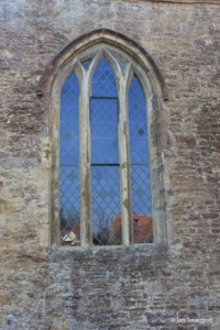 Harrold - St Peter. North aisle, north-west window.