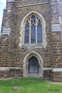 Houghton Conquest - All Saints. Tower, west door and window.