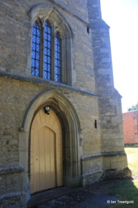 Pertenhall - St Peter. West door and window.