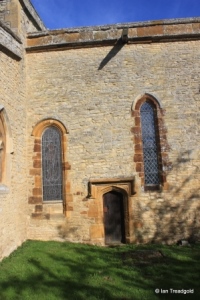 Podington - St Mary. Chancel, south-western windows and door.
