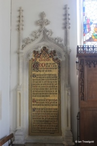 Cranfield - St Peter & St Paul. Altar, carved tablet left.