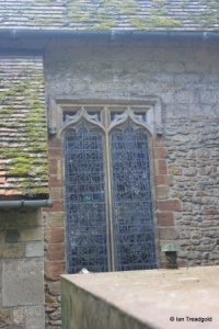 Stagsden - St Leonard. Chancel, north-west window.