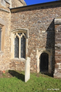 Sutton - All Saints. Chancel, south-west window and priest's door.