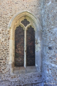 Sutton - All Saints. Chancel, north-west window.