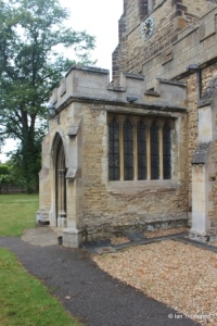Cople - All Saints. South porch from east side.