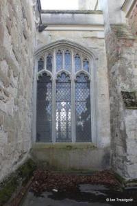 Toddington - St George. Chancel, north-west window.