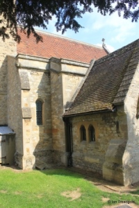 Clapham - St Thomas of Canterbury. South aisle, south-west window and porch.