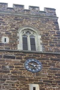 Eversholt - St John the Baptist. Tower clock face and belfry.